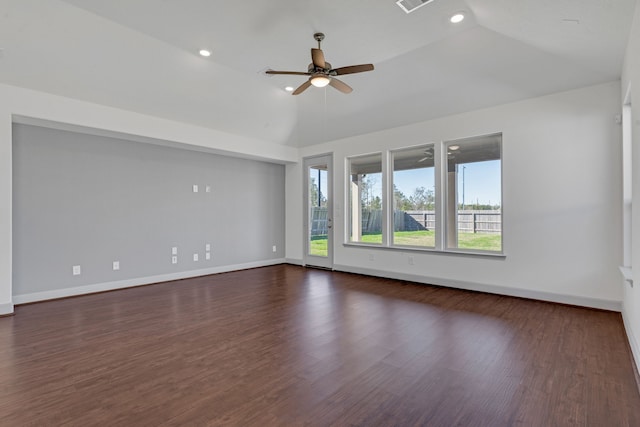 empty room with dark hardwood / wood-style floors, ceiling fan, and lofted ceiling