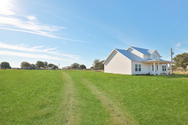 view of property exterior featuring a lawn