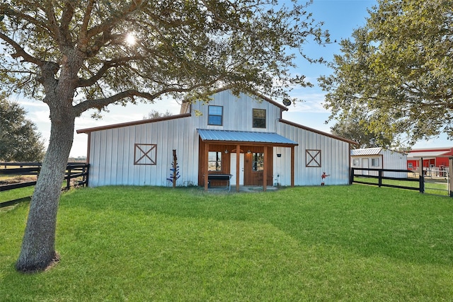 view of outdoor structure with a lawn