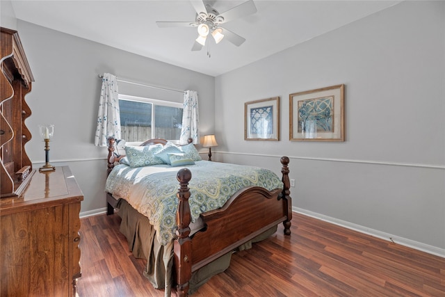 bedroom with ceiling fan and dark hardwood / wood-style floors