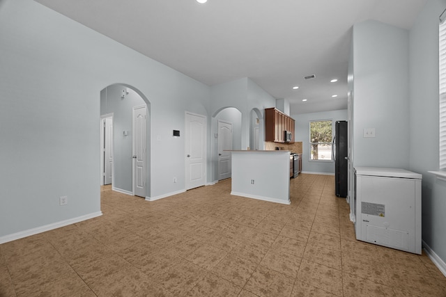 kitchen with black fridge