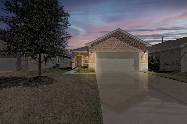 ranch-style home with a lawn