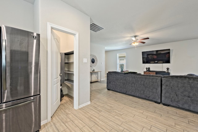 living room with ceiling fan