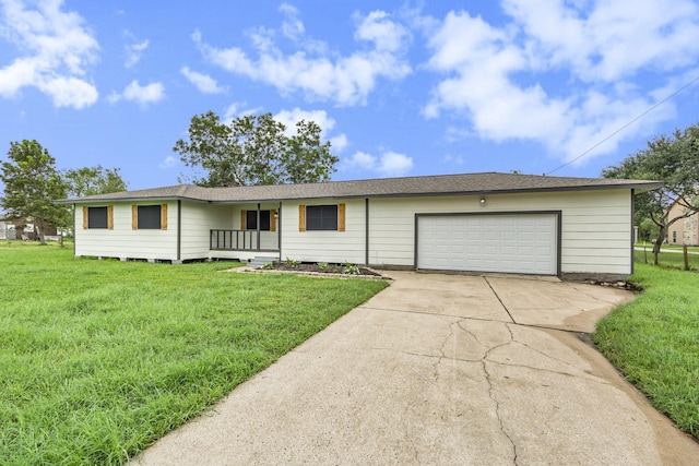 ranch-style house with a front yard and a garage