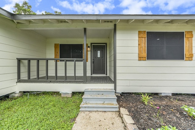 property entrance with a porch