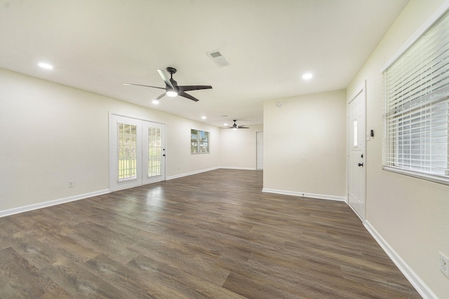 unfurnished room featuring ceiling fan and dark hardwood / wood-style flooring