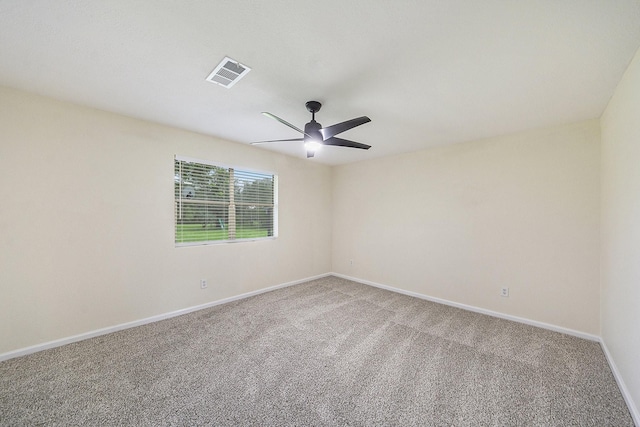 unfurnished room featuring carpet flooring