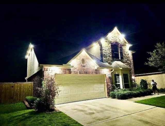 view of front of property featuring a garage