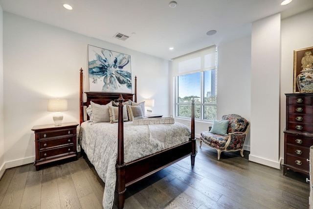 bedroom featuring dark wood-type flooring