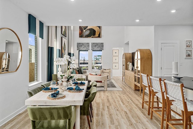 dining area with light hardwood / wood-style flooring