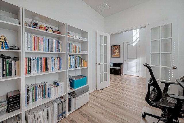 home office with light wood-type flooring