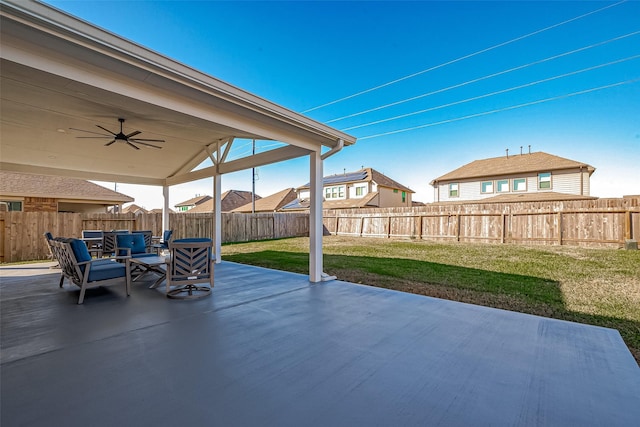 view of patio / terrace featuring ceiling fan