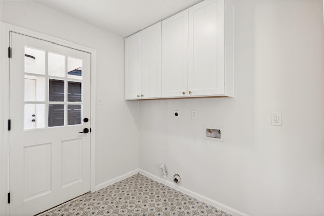 laundry room featuring electric dryer hookup, cabinets, gas dryer hookup, and hookup for a washing machine