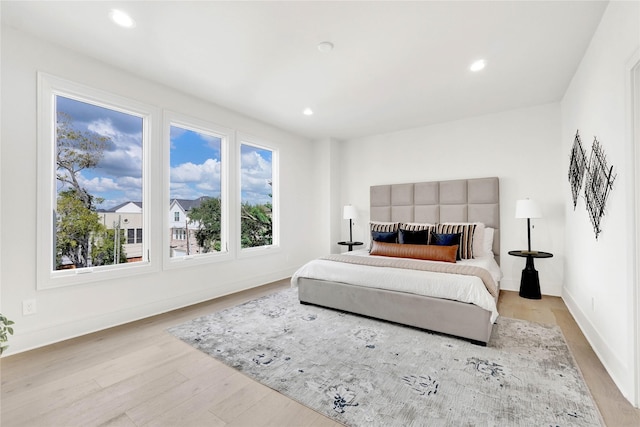 bedroom featuring light wood-type flooring