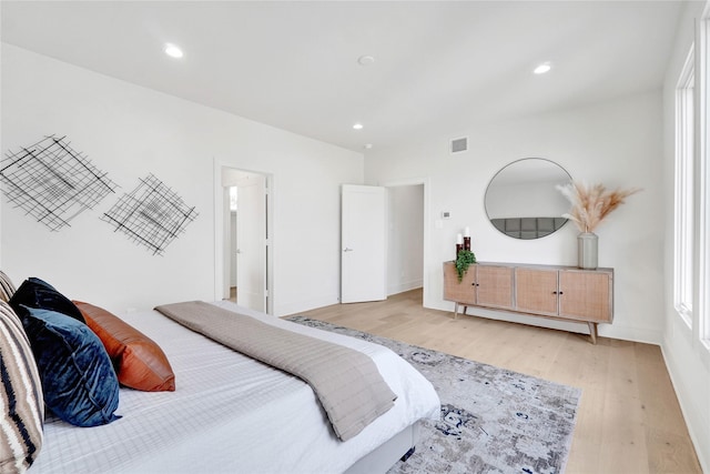 bedroom featuring light hardwood / wood-style flooring