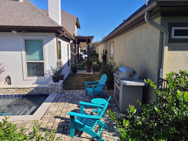 view of patio / terrace with grilling area and exterior kitchen