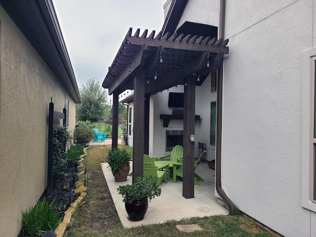 view of patio with a pergola