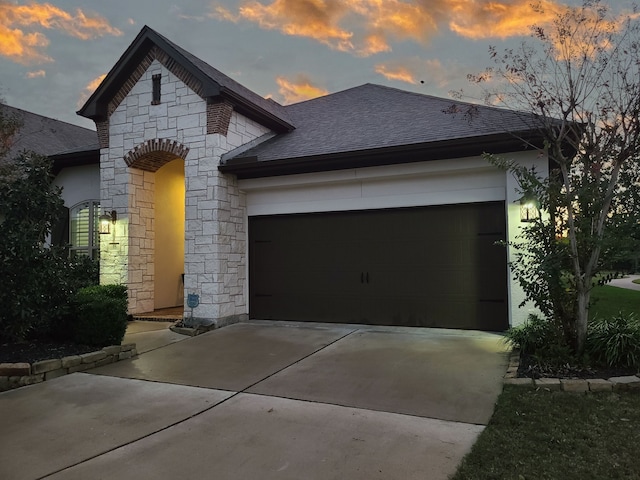 view of front of property featuring a garage