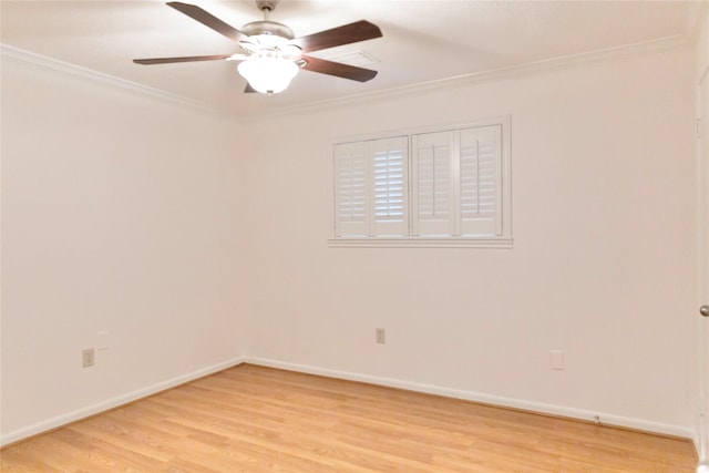 empty room with light hardwood / wood-style floors, ornamental molding, and ceiling fan