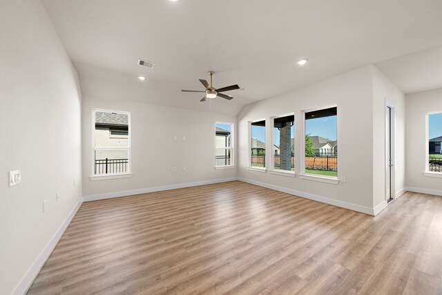 9760 Rockwell Dr, Willis, TX 77318 - spare room featuring plenty of natural light, ceiling fan, light wood-type flooring, and recessed lighting