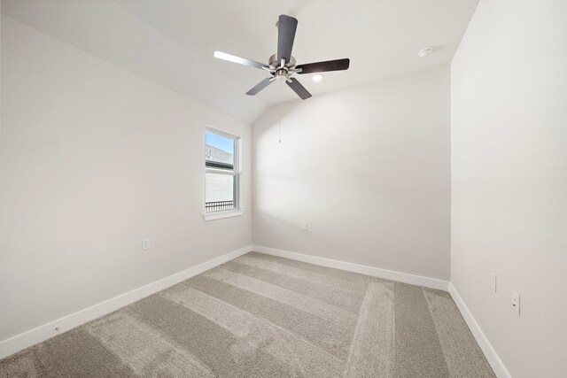 9760 Rockwell Dr, Willis, TX 77318 - spare room with light carpet, a ceiling fan, and a smoke detector
