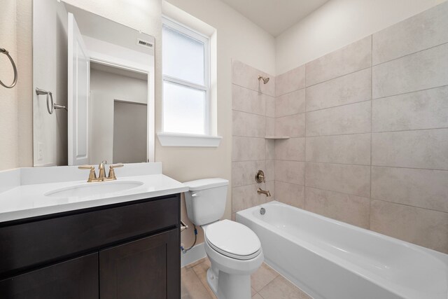 9760 Rockwell Dr, Willis, TX 77318 - bathroom with vanity, shower / bathtub combination, and tile patterned floors