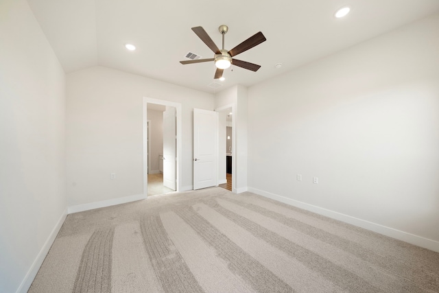 9760 Rockwell Dr, Willis, TX 77318 - unfurnished bedroom featuring recessed lighting, light colored carpet, ceiling fan, and ensuite bath
