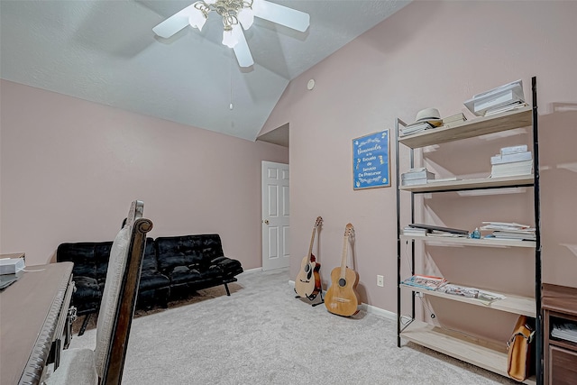 interior space featuring ceiling fan and lofted ceiling