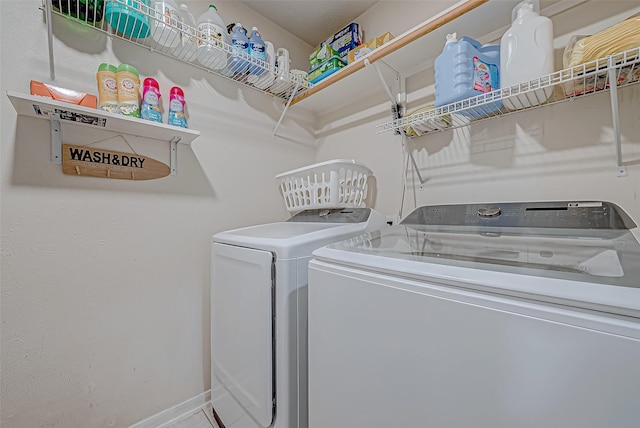 washroom with washer and clothes dryer