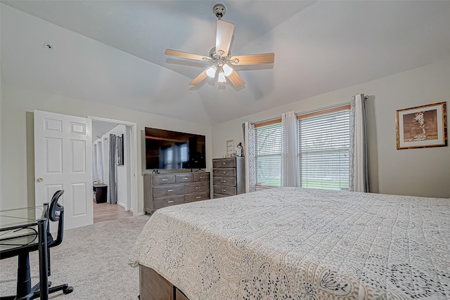 bedroom featuring ceiling fan, light colored carpet, and lofted ceiling