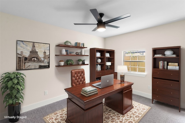 office area featuring ceiling fan and light colored carpet