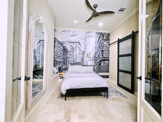 bedroom featuring a barn door, ceiling fan, and crown molding