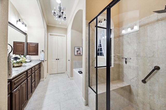 bathroom featuring crown molding, vanity, a chandelier, and shower with separate bathtub