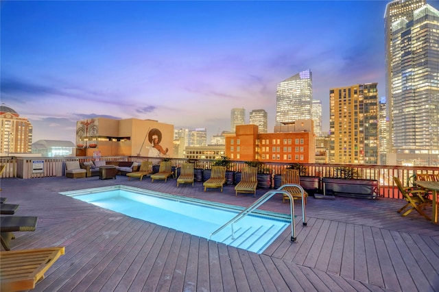 915 Franklin St Unit 3G, Houston, TX 77002 - pool at dusk featuring a deck
