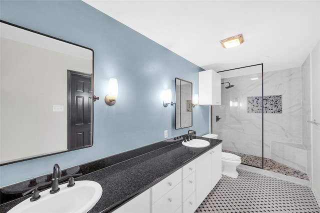 915 Franklin St Unit 3G, Houston, TX 77002 - bathroom with vanity, toilet, and a tile shower