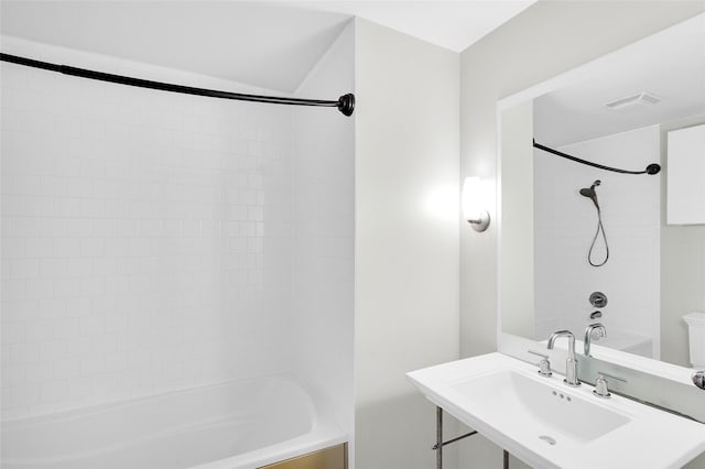915 Franklin St Unit 3G, Houston, TX 77002 - full bathroom with toilet, sink, and tiled shower / bath