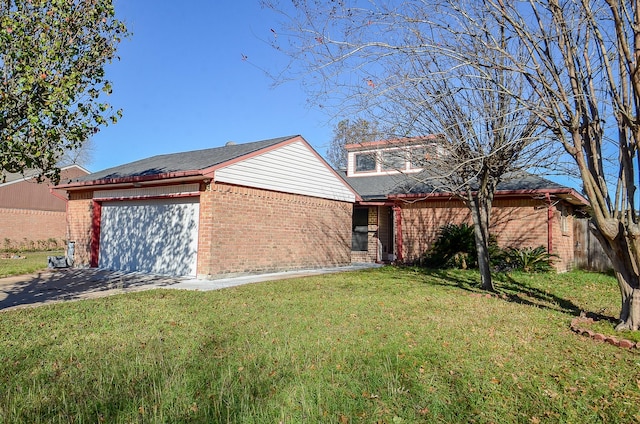 exterior space featuring a yard and a garage