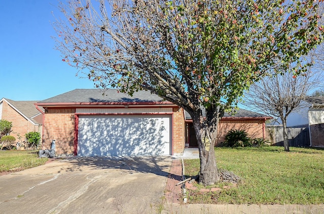 garage featuring a lawn