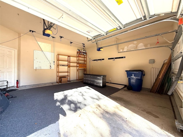 garage featuring a garage door opener