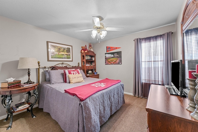 bedroom featuring baseboards, a ceiling fan, and light colored carpet