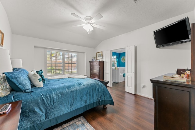 bedroom featuring dark wood-type flooring, a ceiling fan, vaulted ceiling, a textured ceiling, and baseboards