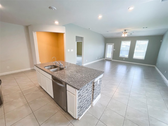 kitchen with sink, a center island with sink, stone counters, dishwasher, and white cabinetry