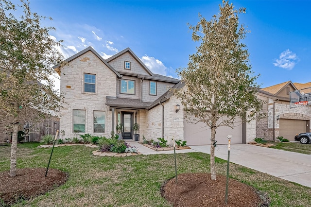 craftsman inspired home with a front yard and a garage