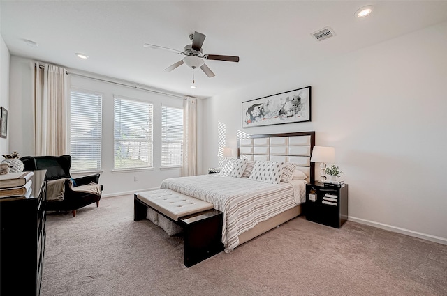 carpeted bedroom featuring ceiling fan