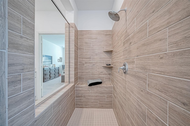 bathroom with tiled shower