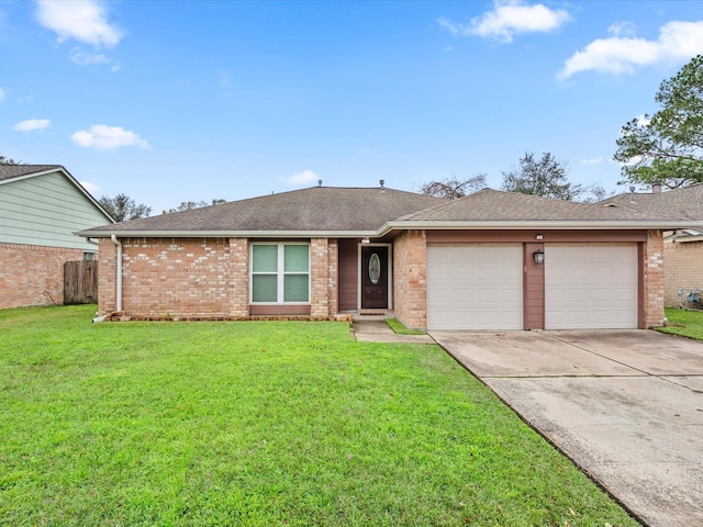 ranch-style house with a garage and a front lawn