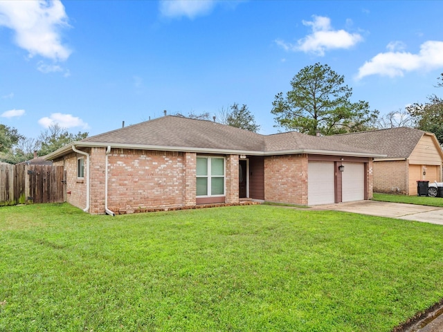 ranch-style house featuring a garage and a front lawn