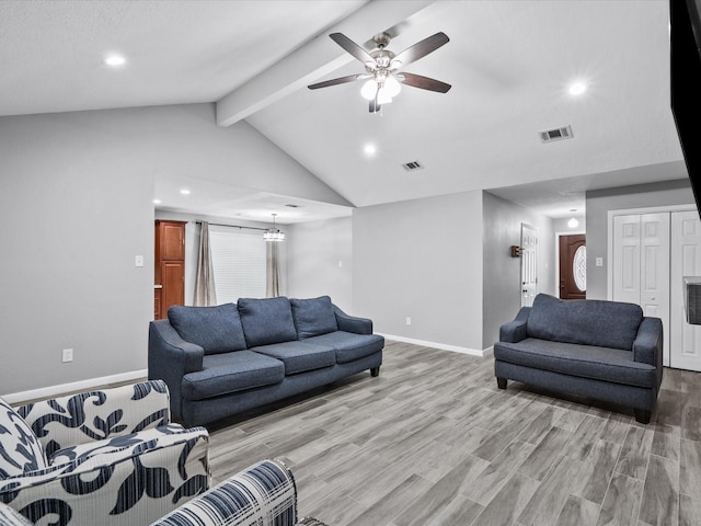 living room featuring vaulted ceiling with beams, light hardwood / wood-style floors, and ceiling fan