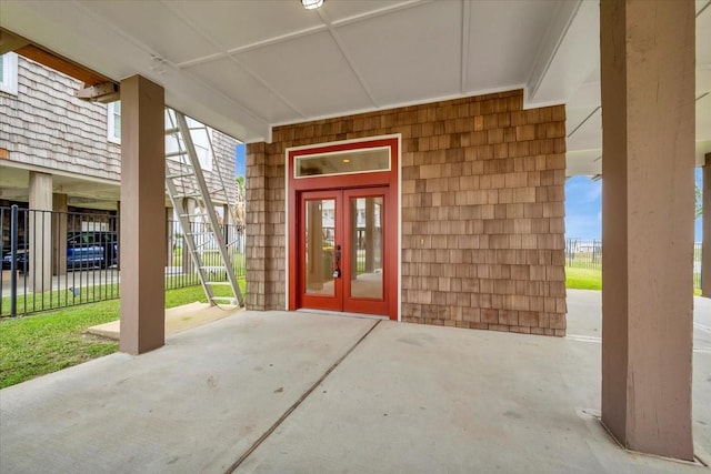 entrance to property with a patio and french doors