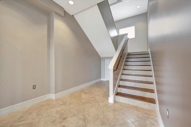 staircase with tile patterned flooring